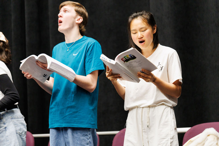 Ginger Jiang sings during a rehearsal for the musical "Rent" at USC Upstate