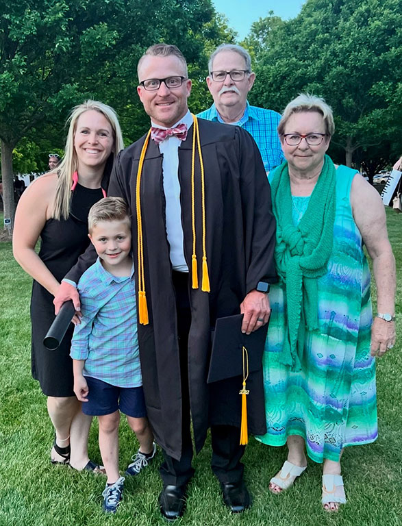 Sean Turner '22 stands with his family on his graduation day in May 2022.
